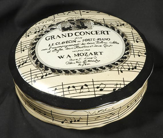 Mozart porcelain box. ''The elaborate title pages of eighteenth-century publications served to attract the bourgeois market as much as to honor the dedicatee. Stripped of the music behind it, the title page remains a nostalgic reminiscence of an era of class.''
