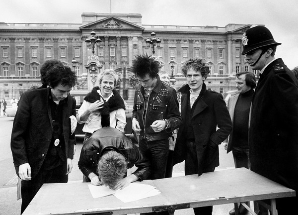  pulmyears.files Sex Pistols signing. Paul Myers: ''Malcolm McLaren is remembered largely as “an entrepreneur” or a “manager” but such a limited appellations are about as useful as describing P.T. Barnum a “show producer.” McLaren also staged The Greatest Shows on Earth, in his heyday, and up until yesterday, he was a living legend and would have been the first to tell you that. And why, on earth, wouldn’t he take credit for it? The man worked damn hard at becoming Malcolm McLaren. He was many things, culture appropriator, manager, exploiter and charlatan. But you know what, financial matters aside (I’m thinking of the embittered former Sex Pistol Steve Jones), he was never a liar. The whole “punk rock mythos” of being up front when you sell out and being openly greedy and selfish in demanding attention, was not a lie. Unlike most others in the shallow business of show, McLaren’s biggest con was that it wasn’t just a scam, it was all real.''