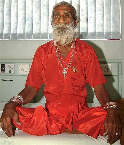 Owns nothing. No credit card. no mortgage. no car. debt free. ''"I feel no need for food and water," states Prahladbhai Jani, a seventy-six year old Indian ascetic who lives in a cave near the Ambaji temple in the state of Gujarat. Mr. Jani claims that he has not had food or fluids to drink for the last sixty-five years. At the age of seven years he left home in search of spiritual unfoldment. Jani states that at the age of eleven years he was blessed by a goddess. He claims that since that blessing he has gained his sustenance from nectar that filters down through a hole in his palate, and has not passed urine or stools since then. Mr. Jani explained, "I get the elixir of life from the hole in my palate, which enables me to go without food and water." Almost daily Mr. Jani enters a state of Samadhi characterized by extreme bliss and enormous light and strength. He says that he has never experienced medical problems. He says that he did not speak for a period of forty-five years.''